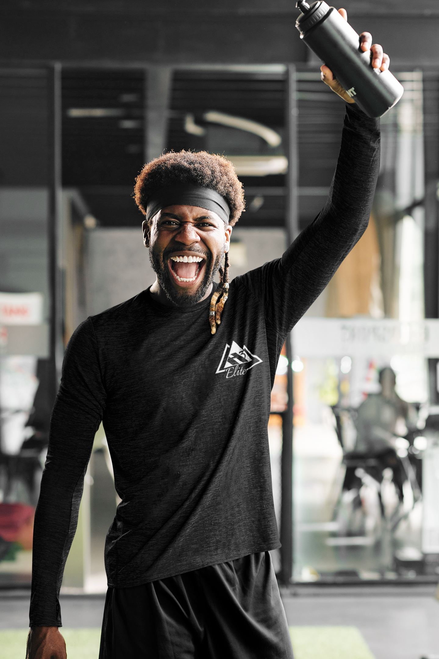 Black "Elite Onset" long sleeve t-shirt with white logo on man in gym